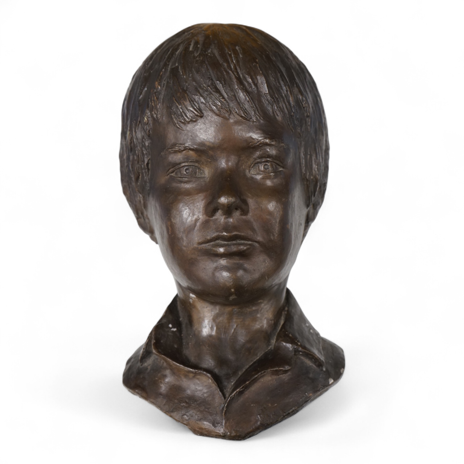A bronzed head of a child, unsigned, 33cm high